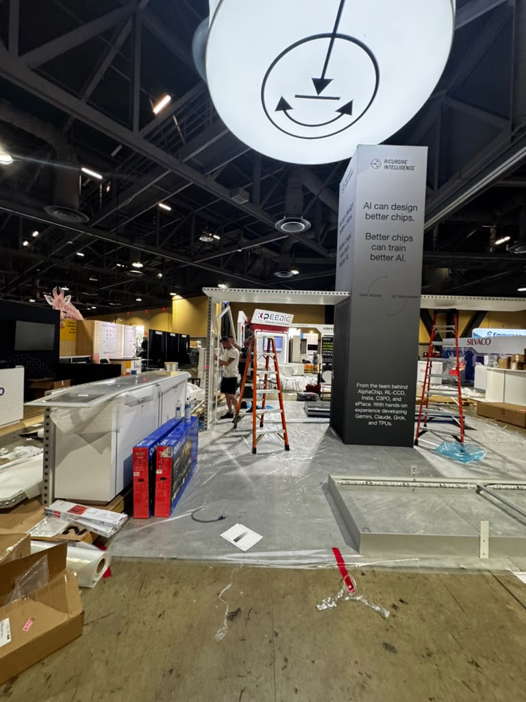 Trade show booth for EsquireTek featuring a custom putting game setup, showcasing branding and promotional messaging about powering legal teams and efficient case management.