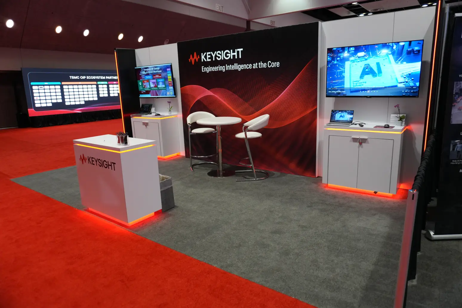 Keysight Technologies booth right angle with AI demo station and meeting area