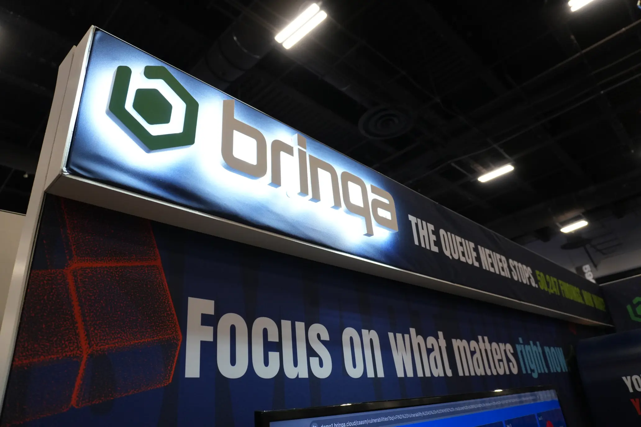 Brinqa illuminated sign trade show booth