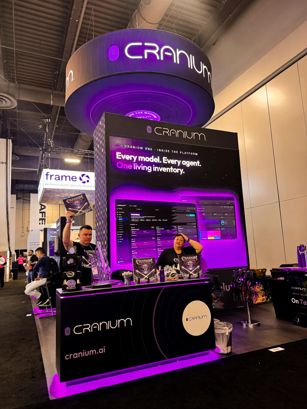 Custom trade show booth lounge area design with comfortable seating, branded environment, and premium finishes for executive engagement.
